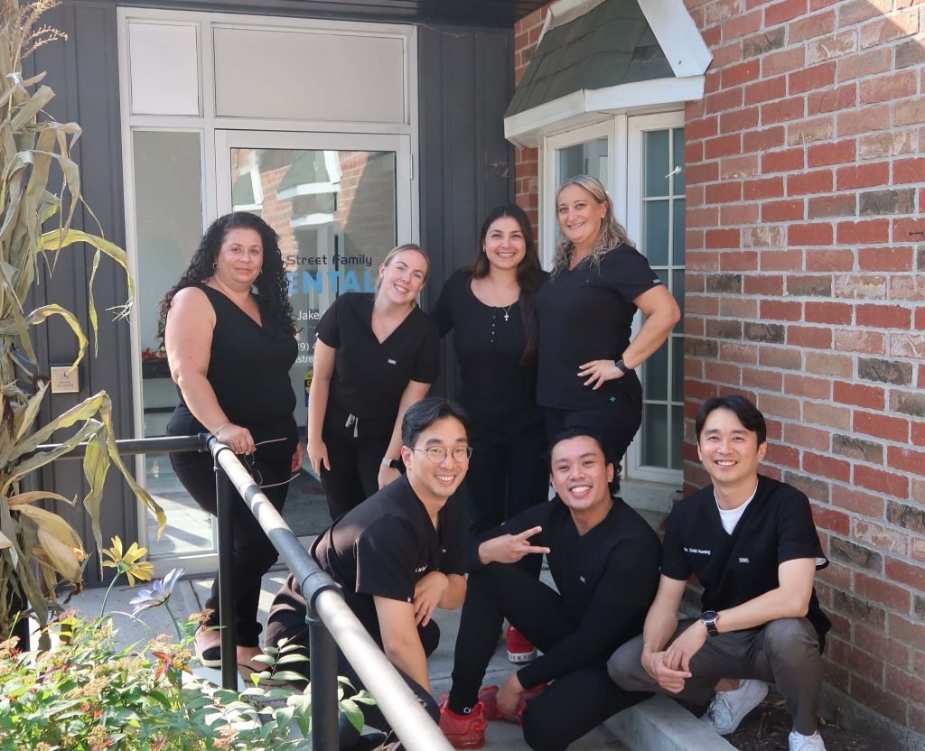 The Mill Street Family Dental team outside their Tottenham clinic